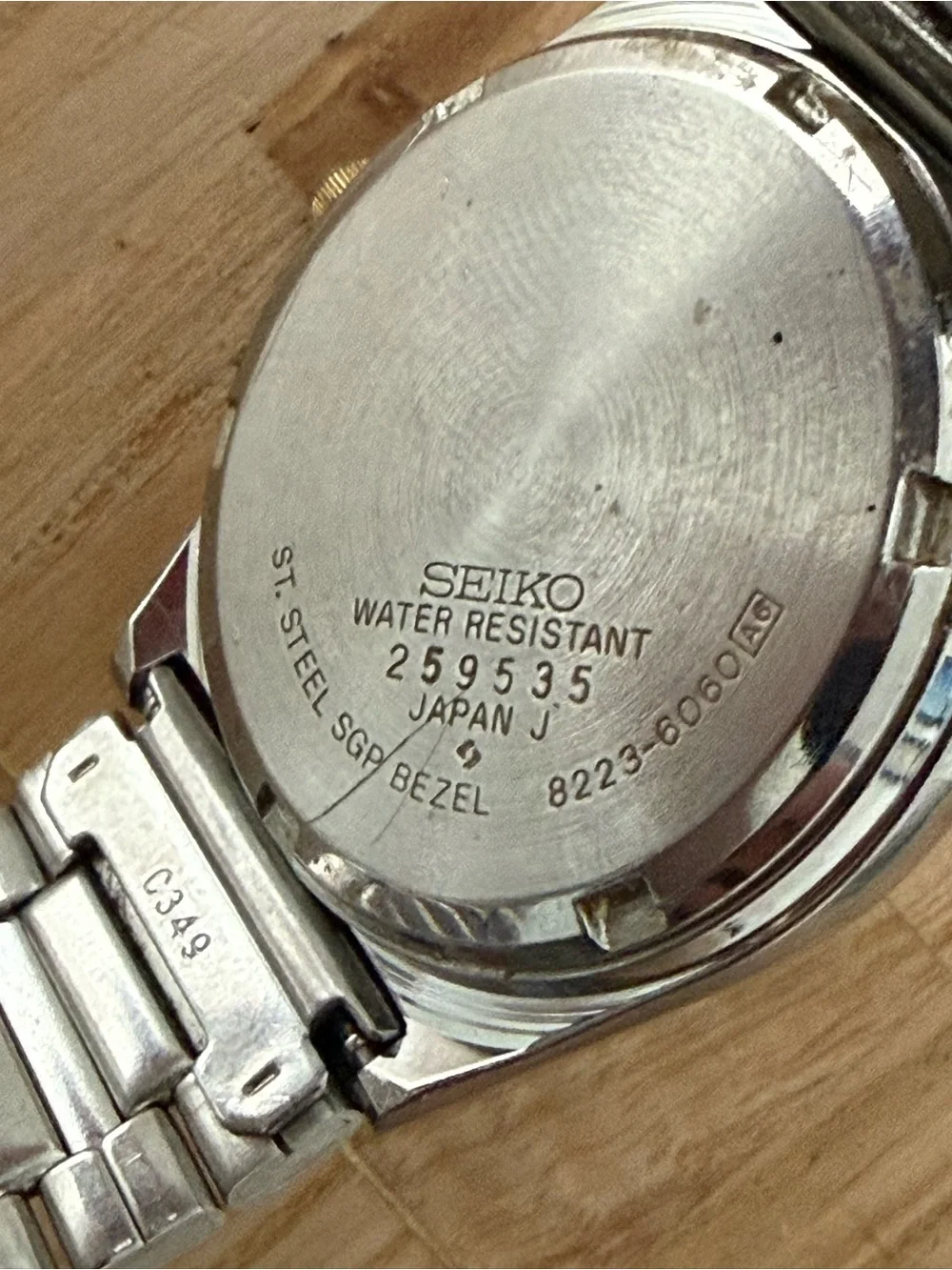 Seiko SQ Vintage Watch Gold Plated Bezel and Bracelet Black Dial Date Window